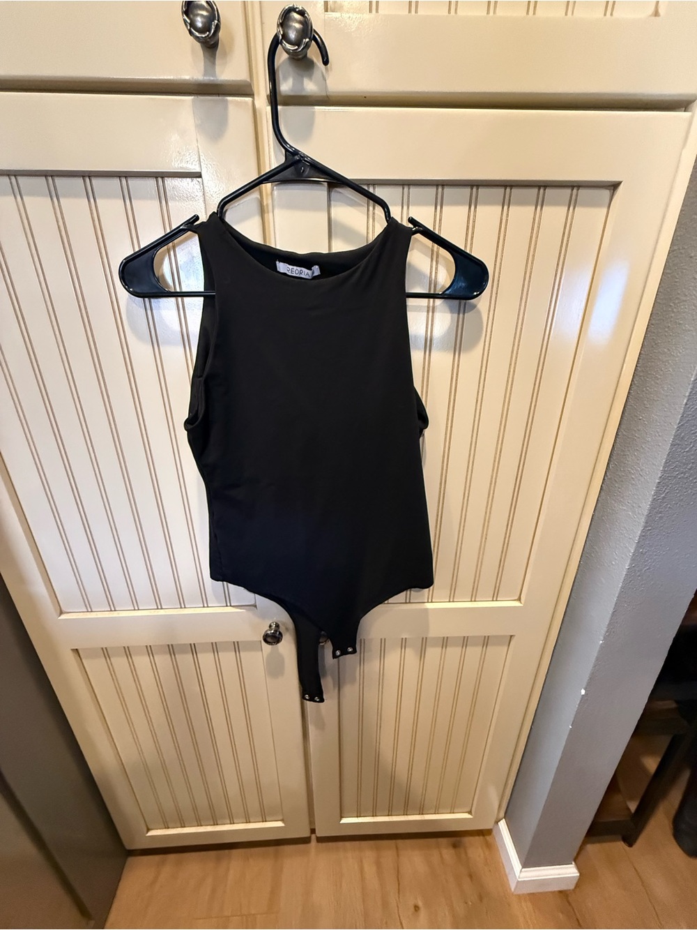 Black Sleeveless Snap-Closure Bodysuit